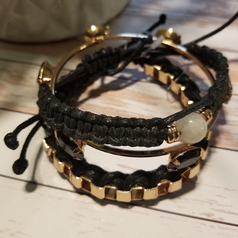 Stack bracelets gold and black.